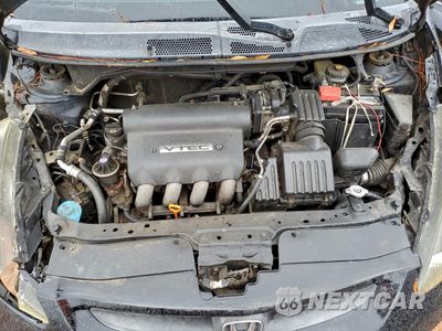 Zdjęcie 12 z 13 samochodu: 2007 HONDA FIT S VIN:JHMGD38697S052172 - miniatura