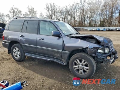 Czwarte zdjęcie samochodu z boku: 2004 LEXUS LX 470 VIN:JTJHT00W143543972 - miniatura