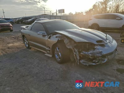 Czwarte zdjęcie samochodu z boku: 1999 PONTIAC FIREBIRD FORMULA VIN:2G2FV22GXX2220518 - miniatura