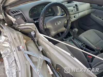Zdjęcie 8 z 11 samochodu: 2002 TOYOTA CAMRY LE VIN:4T1BF30K02U003255 - miniatura