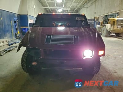 Piąte zdjęcie samochodu w środku: 2003 HUMMER H2 VIN:5GRGN23U23H144695 - miniatura