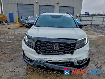 Piąte zdjęcie samochodu w środku: 2022 HONDA PASSPORT ELITE VIN:5FNYF8H01NB015023 - miniatura