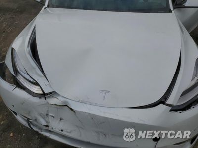 Zdjęcie 11 z 12 samochodu: 2021 TESLA MODEL Y VIN:5YJYGDEEXMF269821 - miniatura