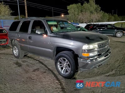 Czwarte zdjęcie samochodu z boku: 2000 CHEVROLET TAHOE K1500 VIN:1GNEK13T7YJ180165 - miniatura