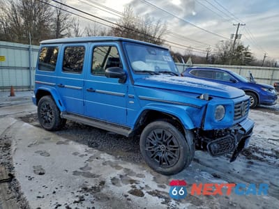 Czwarte zdjęcie samochodu z boku: 2025 MERCEDES-BENZ G 580E VIN:W1NWM0AB3SX025511 - miniatura