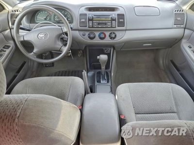 Zdjęcie 8 z 14 samochodu: 2003 TOYOTA CAMRY LE VIN:4T1BF32K63U565885 - miniatura