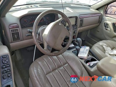 Zdjęcie 8 z 12 samochodu: 2000 JEEP GRAND CHEROKEE LIMITED VIN:1J4GW58N6YC227501 - miniatura