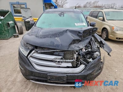 Piąte zdjęcie samochodu w środku: 2016 FORD EDGE TITANIUM VIN:2FMPK4K98GBB85351 - miniatura