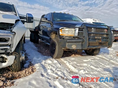 Czwarte zdjęcie samochodu z boku: 2009 DODGE 3500 FLATBED TRUCK VIN:3D7MX48L09G512312 - miniatura