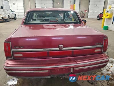 Zdjęcie 6 z 11 samochodu: 1991 LINCOLN TOWN CAR EXECUTIVE VIN:1LNCM81W8MY744354 - miniatura