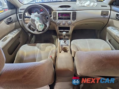 Zdjęcie 8 z 12 samochodu: 2006 KIA OPTIMA LX VIN:KNAGE123165023468 - miniatura