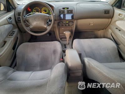 Zdjęcie 8 z 14 samochodu: 2001 TOYOTA COROLLA CE VIN:1NXBR12E51Z477624 - miniatura