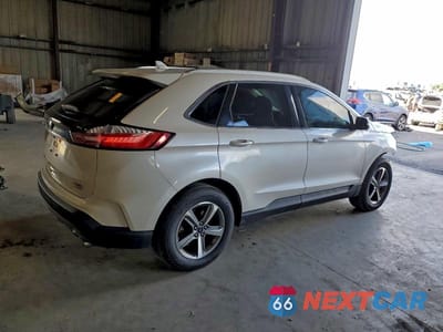 Trzecie zdjęcie samochodu z tyłu: 2019 FORD EDGE SEL VIN:2FMPK3J90KBB99717 - miniatura