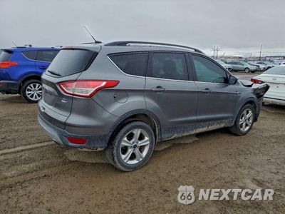 Trzecie zdjęcie samochodu z tyłu: 2014 FORD ESCAPE SE VIN:1FMCU9GXXEUD66374 - miniatura