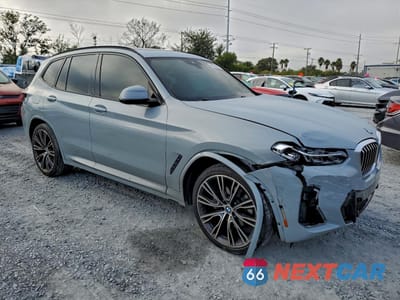 Czwarte zdjęcie samochodu z boku: 2022 BMW X3 SDRIVE30I VIN:5UX43DP03N9L75310 - miniatura