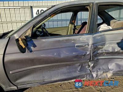 Zdjęcie 7 z 13 samochodu: 2000 NISSAN SENTRA BAS VIN:3N1CB51A0YL385671 - miniatura