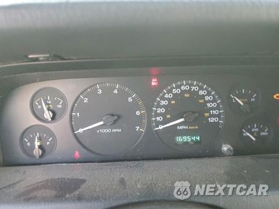 Zdjęcie 9 z 14 samochodu: 2004 JEEP GRAND CHEROKEE LAREDO VIN:1J4GW48S14C302213 - miniatura