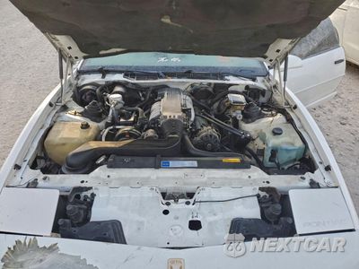 Zdjęcie 11 z 13 samochodu: 1991 PONTIAC FIREBIRD TRANS AM VIN:1G2FW2384ML211992 - miniatura