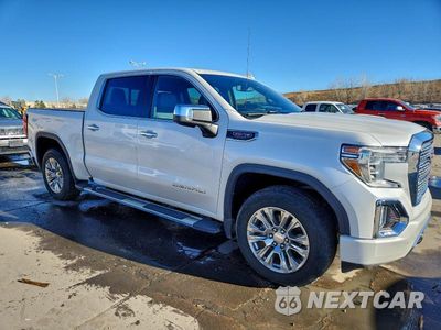 Czwarte zdjęcie samochodu z boku: 2019 GMC SIERRA K1500 DENALI VIN:3GTU9FEL7KG183862 - miniatura