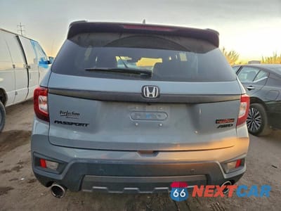 Zdjęcie 6 z 11 samochodu: 2023 HONDA PASSPORT TRAIL SPORT VIN:5FNYF8H64PB015606 - miniatura