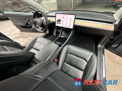 Piąte zdjęcie samochodu w środku: 2018 TESLA MODEL 3 VIN:5YJ3E1EB1JF119497 - miniatura