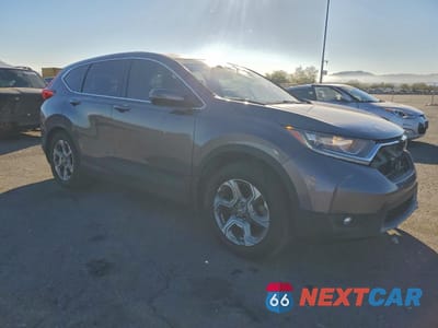 Czwarte zdjęcie samochodu z boku: 2017 HONDA CR-V EXL VIN:7FARW1H85HE019473 - miniatura