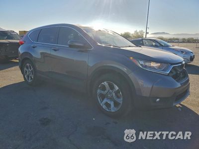 Czwarte zdjęcie samochodu z boku: 2017 HONDA CR-V EXL VIN:7FARW1H85HE019473 - miniatura