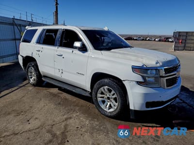 Czwarte zdjęcie samochodu z boku: 2019 CHEVROLET TAHOE K1500 LT VIN:1GNSKBKCXKR306232 - miniatura