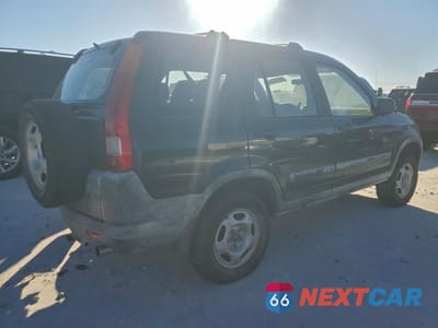 Trzecie zdjęcie samochodu z tyłu: 2002 HONDA CR-V LX VIN:JHLRD68412C016959 - miniatura