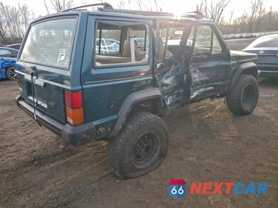 Trzecie zdjęcie samochodu z tyłu: 1996 JEEP CHEROKEE SPORT VIN:1J4FJ68S9TL205829 - miniatura