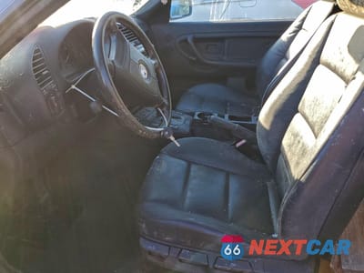 Zdjęcie 7 z 13 samochodu: 1998 BMW 323 IC AUTOMATIC VIN:WBABJ8325WEM21688 - miniatura