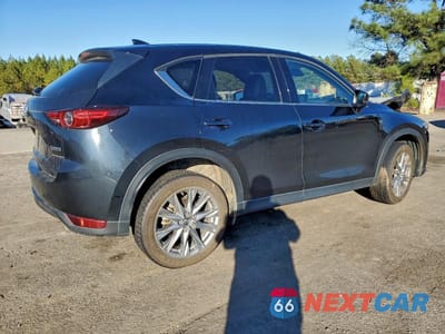 Trzecie zdjęcie samochodu z tyłu: 2021 MAZDA CX-5 GRAND TOURING VIN:JM3KFADM7M0343069 - miniatura