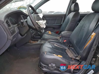 Zdjęcie 7 z 13 samochodu: 2002 HYUNDAI ELANTRA VIN:KMHDN55D92U057946 - miniatura