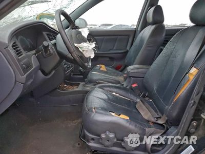 Zdjęcie 7 z 14 samochodu: 2002 HYUNDAI ELANTRA GLS VIN:KMHDN55D92U057946 - miniatura