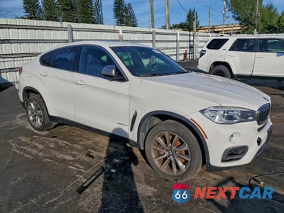 Czwarte zdjęcie samochodu z boku: 2019 BMW X6 50I XDRIVE XLINE VIN:5UXKU6C58KLP60670 - miniatura