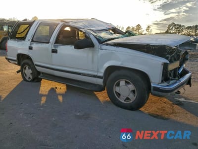 Czwarte zdjęcie samochodu z boku: 1999 CHEVROLET TAHOE K1500 VIN:1GNEK13RXXJ436396 - miniatura