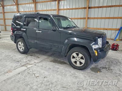 Czwarte zdjęcie samochodu z boku: 2012 JEEP LIBERTY SPORT VIN:1C4PJMAK5CW154384 - miniatura