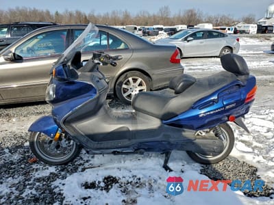 Trzecie zdjęcie samochodu z tyłu: 2003 SUZUKI AN650 K3 VIN:JS1CP51AX32101627 - miniatura