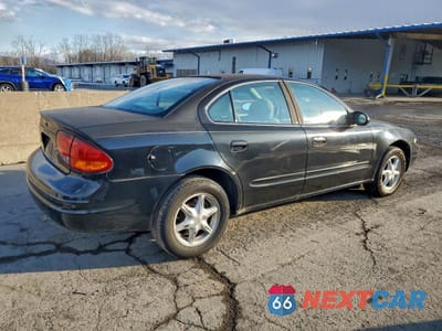 Trzecie zdjęcie samochodu z tyłu: 1999 OLDSMOBILE ALERO GL VIN:1G3NL52T5XC313636 - miniatura