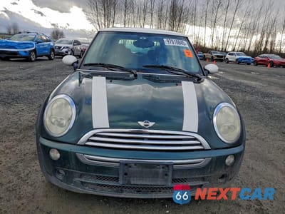 Piąte zdjęcie samochodu w środku: 2005 MINI COOPER VIN:WMWRC33575TK60115 - miniatura