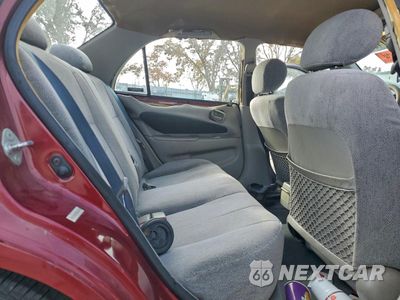Zdjęcie 10 z 13 samochodu: 2000 CHEVROLET GEO PRIZM BASE VIN:1Y1SK5281YZ421313 - miniatura