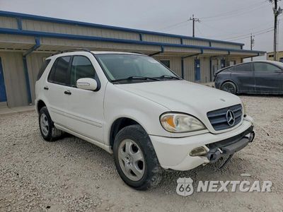Czwarte zdjęcie samochodu z boku: 2003 MERCEDES BENZ ML 350 VIN:4JGAB57E93A420668 - miniatura
