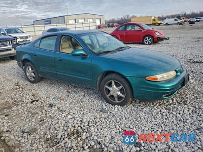 Czwarte zdjęcie samochodu z boku: 1999 OLDSMOBILE ALERO GLS VIN:1G3NF52E5XC355538 - miniatura