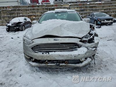 Piąte zdjęcie samochodu w środku: 2017 FORD FUSION TITANIUM HEV VIN:3FA6P0RU5HR357431 - miniatura