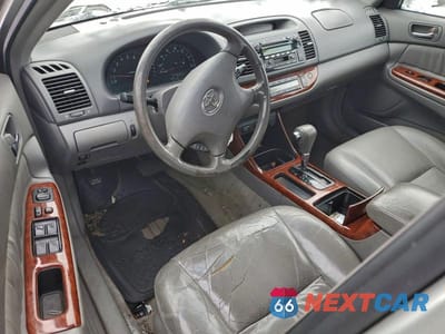 Zdjęcie 8 z 12 samochodu: 2003 TOYOTA CAMRY VIN:4T1BF30K03U061075 - miniatura