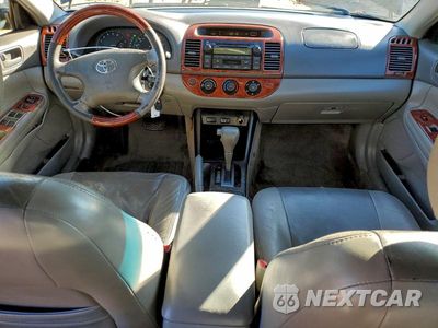 Zdjęcie 8 z 11 samochodu: 2004 TOYOTA CAMRY LE VIN:4T1BE32K44U280672 - miniatura