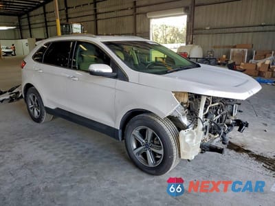 Czwarte zdjęcie samochodu z boku: 2019 FORD EDGE SEL VIN:2FMPK3J90KBB99717 - miniatura