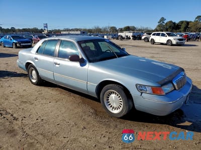Czwarte zdjęcie samochodu z boku: 2002 MERCURY GRAND MARQUIS LS VIN:2MEFM75W82X611269 - miniatura