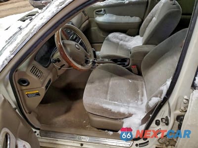 Zdjęcie 7 z 11 samochodu: 2006 KIA OPTIMA LX VIN:KNAGD128765442407 - miniatura