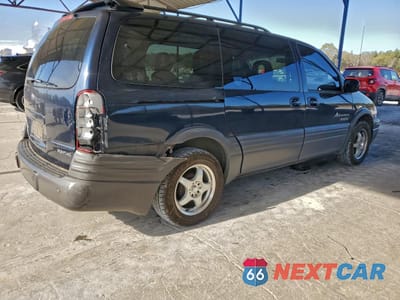 Trzecie zdjęcie samochodu z tyłu: 2002 PONTIAC MONTANA LUXURY VIN:1GMDX13E72D215537 - miniatura